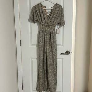 Wide leg polka dot print romper.